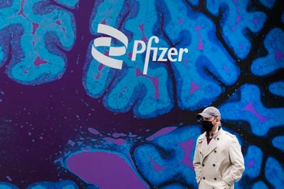 A man walks past the Pfizer offices in New York.
