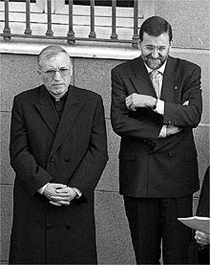 El vicepresidente Mariano Rajoy y el cardenal Antonio María Rouco.