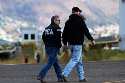 Two DEA agents, during an operation in Central America.