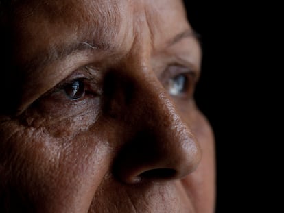 Studio shot of senior woman, close-up