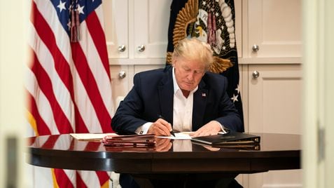 U.S. President Donald Trump works in the Presidential Suite while receiving treatment after testing positive for the coronavirus disease (COVID-19) at Walter Reed National Military Medical Center in Bethesda, Maryland, U.S. October 3, 2020. Joyce N. Boghosia/The White House/Handout via REUTERS  ATTENTION EDITORS - THIS IMAGE HAS BEEN SUPPLIED BY A THIRD PARTY.