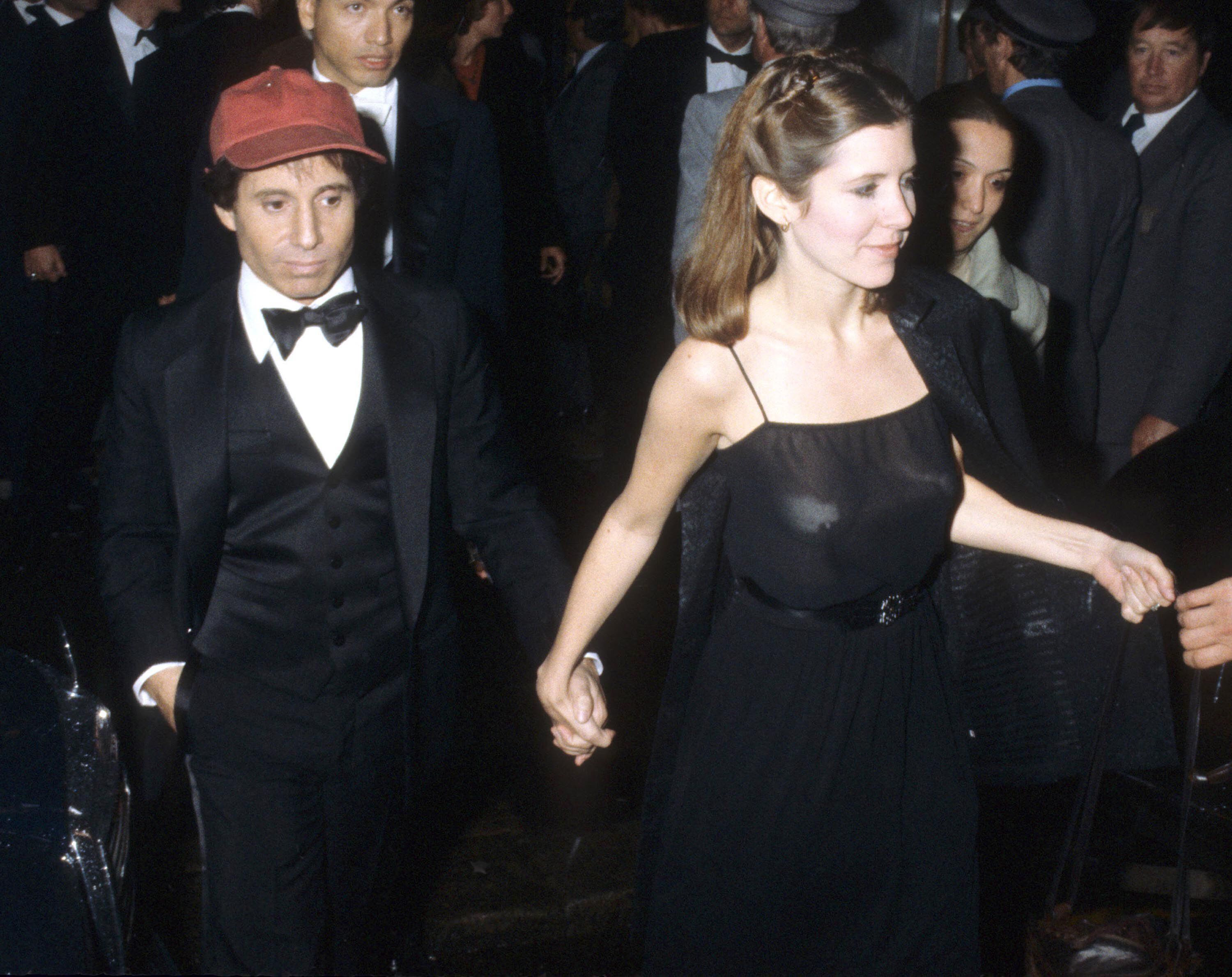 Carrie Fisher y Paul Simon en una fiesta en Londres en mayo de 1978.