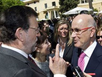 Mariano Rajoy conversa con Josep Antoni Duran en una celebración de la Diada en Barcelona.