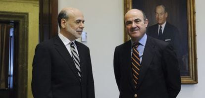 Ben Bernanke y Luis de Guindos.