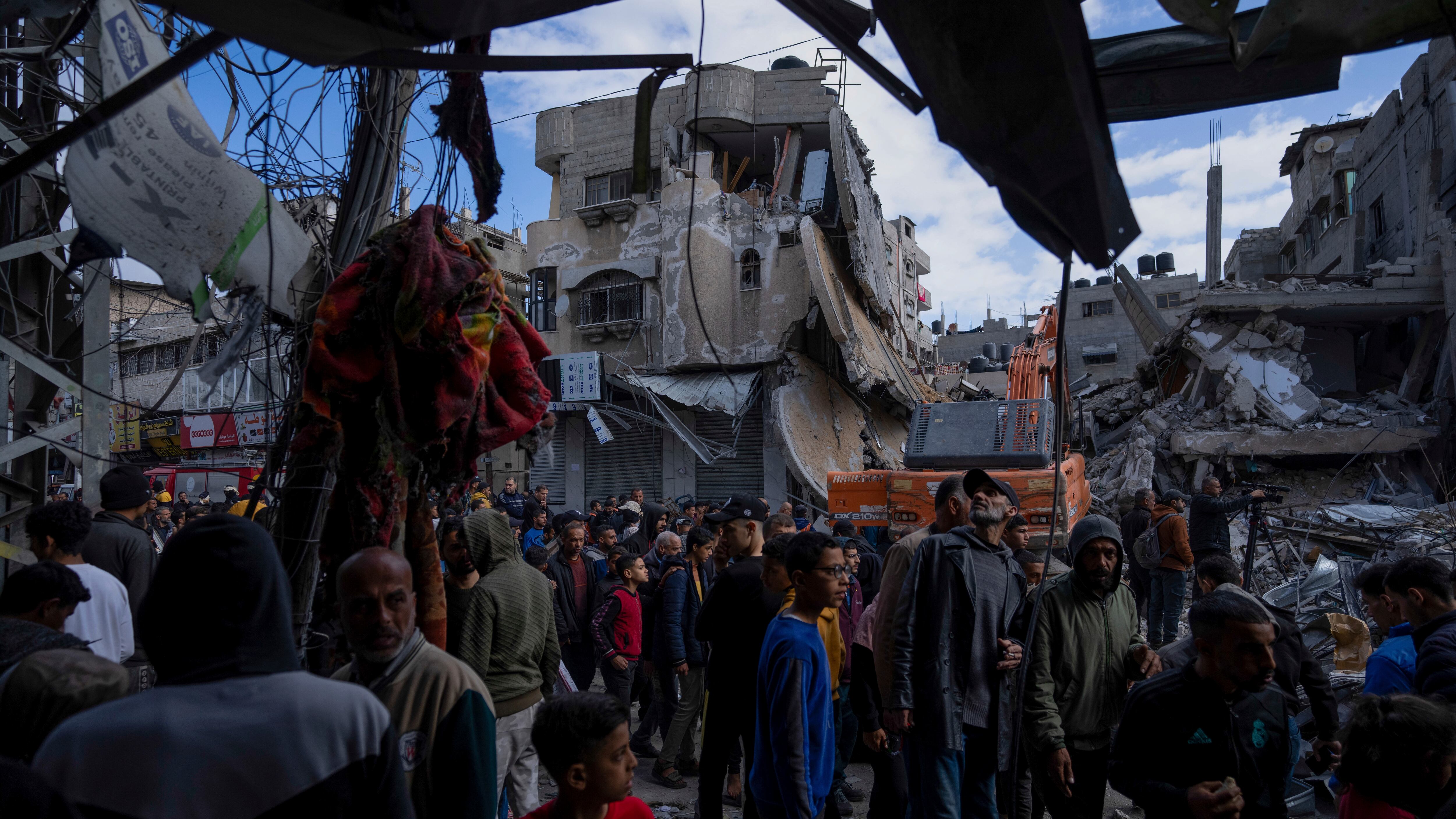 Palestinians check destruction after an Israeli strike in Rafah, Gaza Strip, Monday, March 4, 2024. (AP Photo/Fatima Shbair)