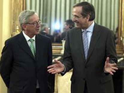 El jefe de Gobierno griego, Andonis Samar&aacute;s y el primer ministro luxemburgu&eacute;s, Jean-Claude Juncker, durante su encuentro en Atenas