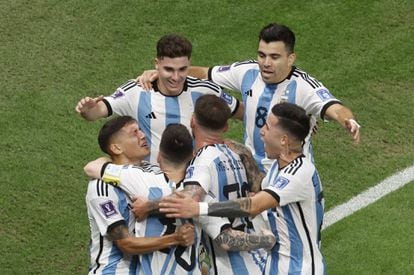 The players of the Argentina team celebrate the first goal of the match.