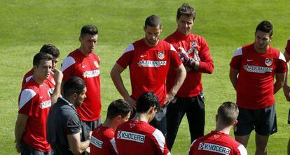 Los jugadores del Atlético durante el entrenamiento.