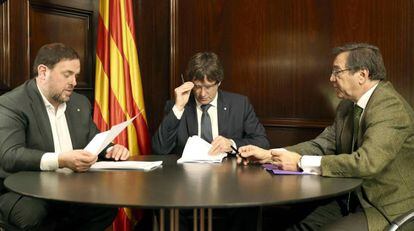 Junqueras, Puigdemont y un secretario del Tribunal Superior de Cataluña.
