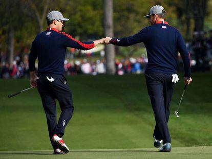 Zach Johnson y Jimmy Walker, de EE. UU.este viernes.