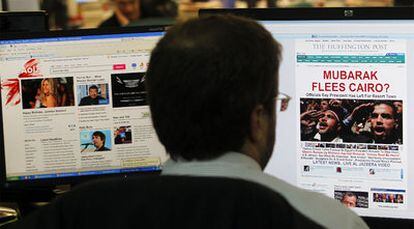 La fotografía muestra las páginas de inicio de AOL y <i>The Huffington Post</i>. La compañía de Internet ha comprado el periódico digital por 315 millones de dólares.