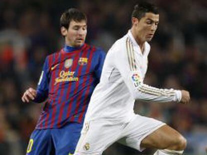 Cristiano Ronaldo, junto a Leo Messi, en uno de los &uacute;ltimos &#039;cl&aacute;sicos&#039;.
