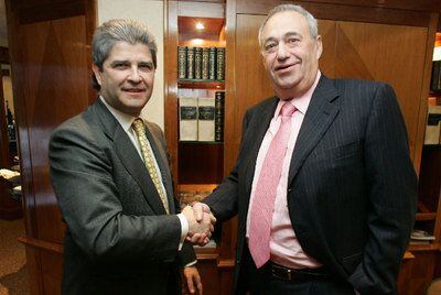 Fernando Martín y Manuel Jove sonríen el día de la venta de Fadesa.