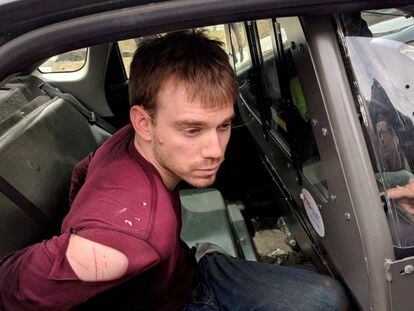 Travis Reinking, tras ser arrestado este lunes por la policía