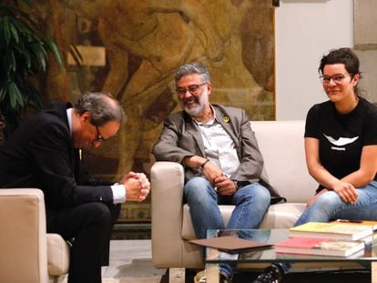 Torra reunido con Carles Riera y Natalia Sánchez (CUP).