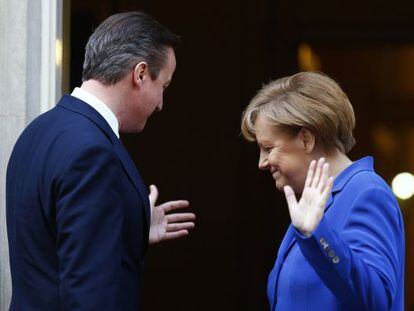 David Cameron y Angela Merkel, reunidos en febrero en Londres.