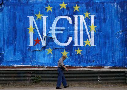 Un grafiti d'Atenes, en què es llegeix "no" en alemany i "sí" en grec.