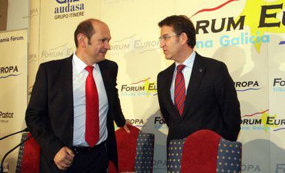 Louzán y Feijóo, durante un desayuno informativo en 2013.