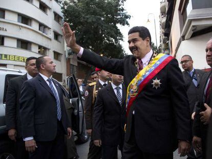 El presidente Nicolás Maduro (derecha).