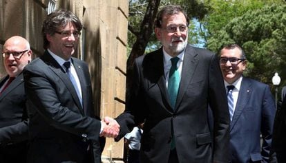 Puigdemont saluda a Rajoy, la semana pasada en Barcelona. 