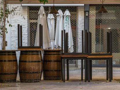 Outdoor typical mediterranean restaurant terrace closed due to coronavirus pandemic.