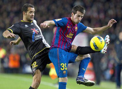 Issac Cuenca, junto a Juanfran.