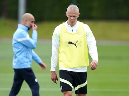 Erling Haaland y Pep Guardiola