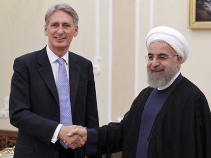 Rohani, con el ministro de Exteriores brit&aacute;nico el 24 de agosto.
