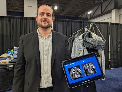 Florent Michel, from Imki, poses in clothes designed with artificial intelligence.