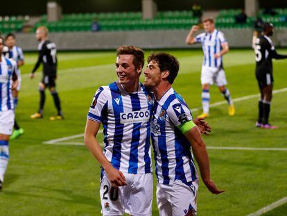 Real Sociedad's Spanish defender Jon Pacheco and Real Sociedad's Spanish defender Aritz Elustondo celebrate a goal during the UEFA Europa League group E football match between Sheriff and Real Sociedad at Zimbru stadium in Chisinau on October 6, 2022. (Photo by BOGDAN TUDOR / AFP)