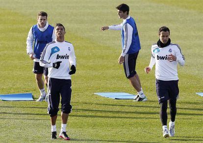 Cristiano, junto a Carvalho en el entrenamiento de ayer.