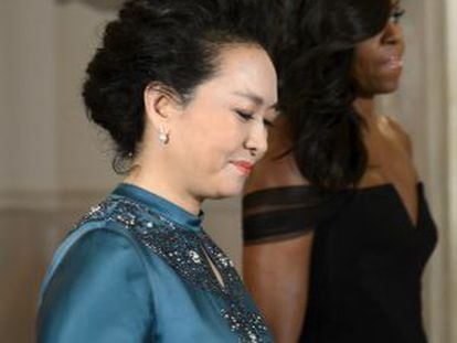 La esposa de Xi, Peng Liyuan, con Michelle Obama, este s&aacute;bado.