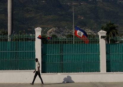 A man walks past the presidential palace in Port-au-Prince, Haiti, this Saturday.