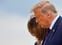 U.S. President Donald Trump and first lady Melania Trump as they arrive at Cleveland Hopkins International Airport to participate in the first presidential debate with Democratic presidential nominee Joe Biden in Cleveland, Ohio, U.S., September 29, 2020. Picture taken September 29, 2020. REUTERS/Carlos Barria