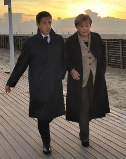 Nicolas Sarkozy y Angela Merkel.