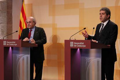 Andreu Mas-Colell (derecha) y Francesc Homs, el pasado 28 de diciembre.