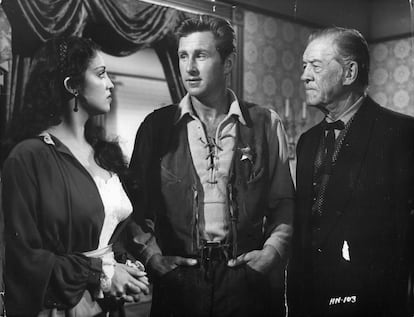Lloyd Bridges and Tom London urge Katy Jurado to remain in Hadleyville in a scene from the film 'High Noon', 1952. (Photo by United Artists/Getty Images)