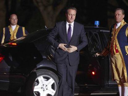 En el centro, el primer ministro brit&aacute;nico, David Cameron, a su llegada a una cena ofrecida a los asistentes a la Cumbre Nuclear de Holanda.