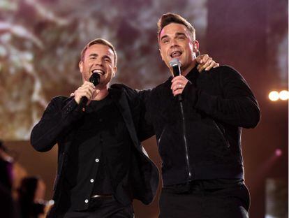 Gary Barlow and Robbie Williams, during a concert in London in 2010.