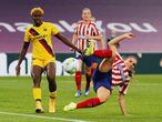 Soccer Football - Women's Champions League - Quarter Final - Atletico Madrid v FC Barcelona - San Mames, Bilbao, Spain - August 21, 2020  BarcelonaÕs Asisat Oshoala in action with Atletico Madrid's Alia Guangni, as play resumes behind closed doors following the outbreak of the coronavirus disease (COVID-19)  Villar Lopez/Pool via REUTERS