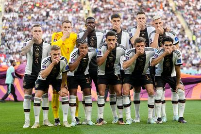 The German national team protest against FIFA censorship at the Khalifa Stadium in Doha.
