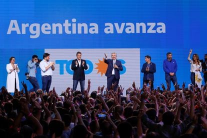 The president of Argentina, Alberto Fernández (center), speaks to his supporters at the campaign center, following the legislative elections on November 14.