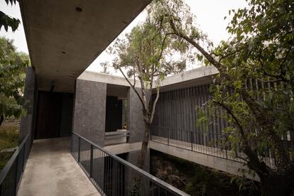 The buildings are built on volcanic stone walls