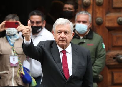 Andrés Manuel López Obrador, greets after casting his vote. 