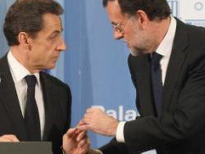 El jefe del Gobierno, Mariano Rajoy, y el presidente francés, Nicolás Sarkozy.