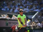 Spain's Rafael Nadal returns the ball to Argentina's Diego Schwartzman during their men's singles quarter-final tennis match on Day 11 of The Roland Garros 2021 French Open tennis tournament in Paris on June 9, 2021. (Photo by Christophe ARCHAMBAULT / AFP)