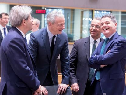eco 40.   BRUSSELS, BELGIUM - DECEMBER 04: (L to R) EU Commissioner for Economy Paolo Gentiloni is talking with the French Minister of the Economy Bruno Le Maire, the Greek Finance Minister Christos Staikouras and the Irish Minister for Public Expenditure and Reform Paschal Luke Donohoe prior the start of an Ministers meeting in the Europa building, the EU Council headquarter on December 4, 2019 in Brussels, Belgium. The Eurogroup is the monthly and informal meeting of the finance ministers of the Member States of the euro zone, with the aim to coordinate their economic policies. (Photo by Thierry Monasse/Getty Images)