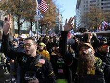 Members of the far-right group Proud Boys march in support of U.S. President Donald Trump to protest against the results of the 2020 U.S. presidential election, in Washington, U.S. November 14, 2020. REUTERS/Jim Urquhart