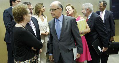 Carmen Martínez Aguayo y Cristóbal Montoro, en una reunión celebrada en julio pasado.