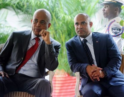 El presidente haitiano Michel Martelly y su primer ministro, Laurent Lamorthe.
